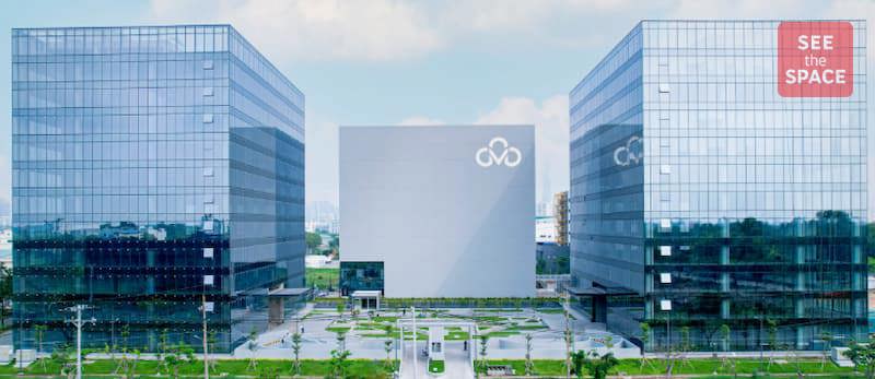 CMC Creative Space — Front facade of CMC Creative Space on Nguyen Thi Thap Street, District 7, a modern creative office building for tech companies and startups